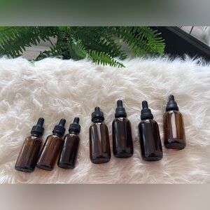 Bundle of 7 amber glass empty bottles 3 1 fl oz and 4 2 fl oz